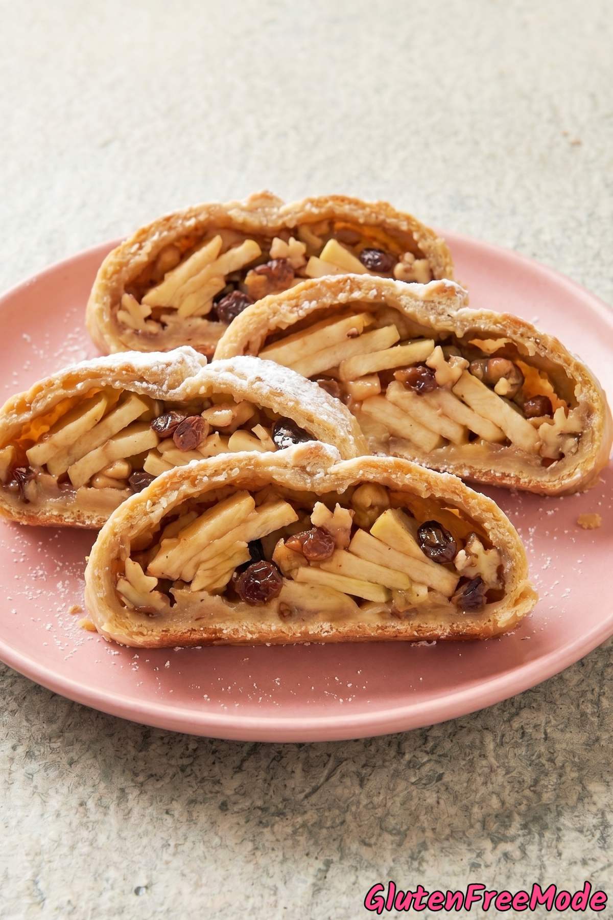 Golden gluten free apple strudel on plate