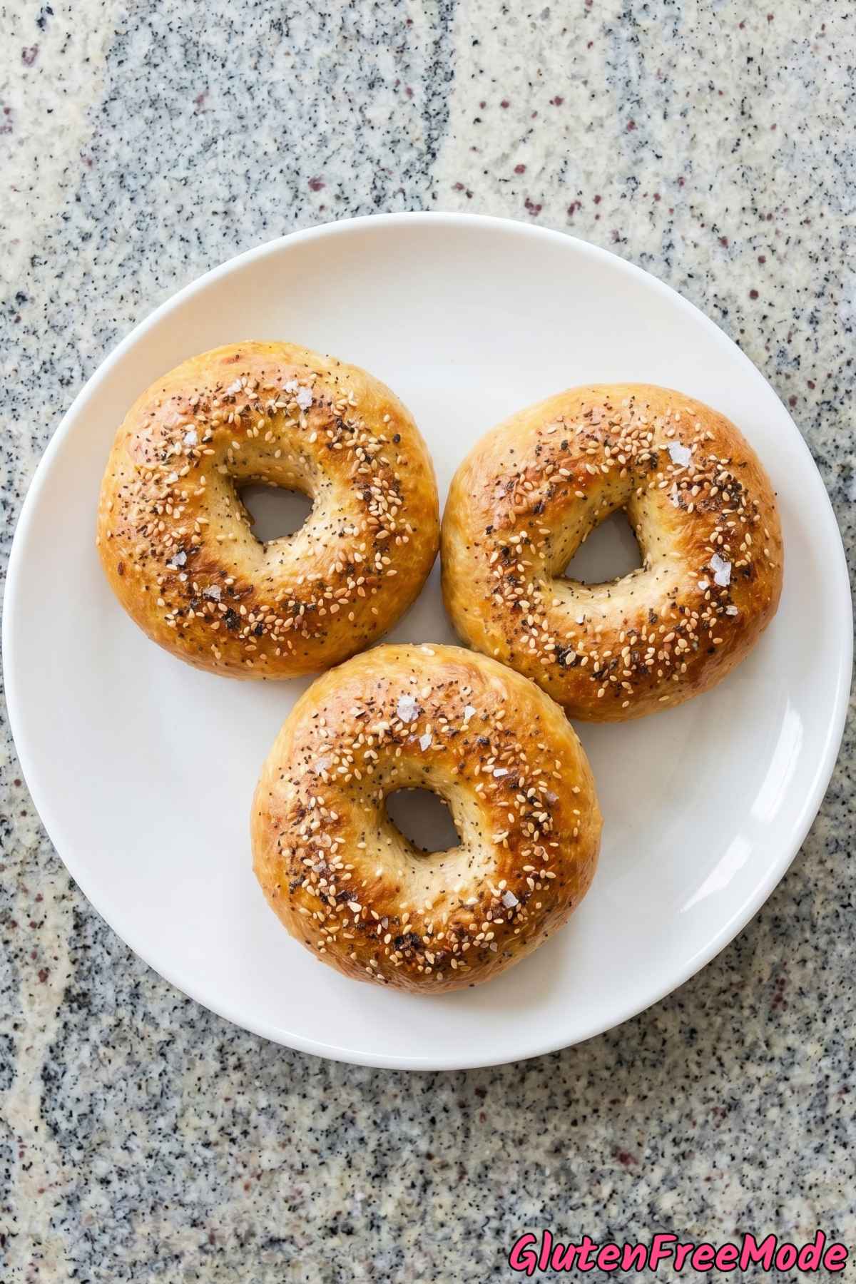 Golden gluten free bagels stacked up