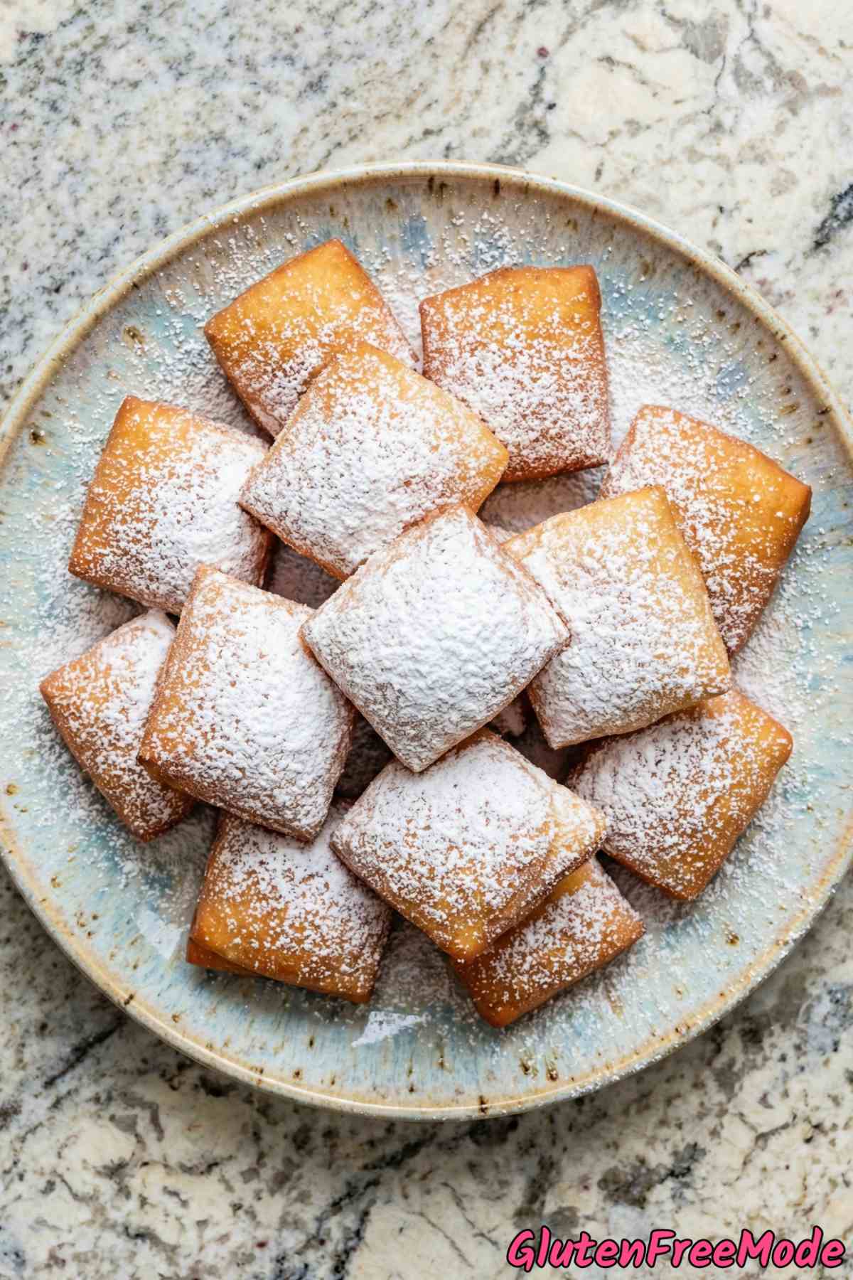 Golden gluten free beignets freshly fried