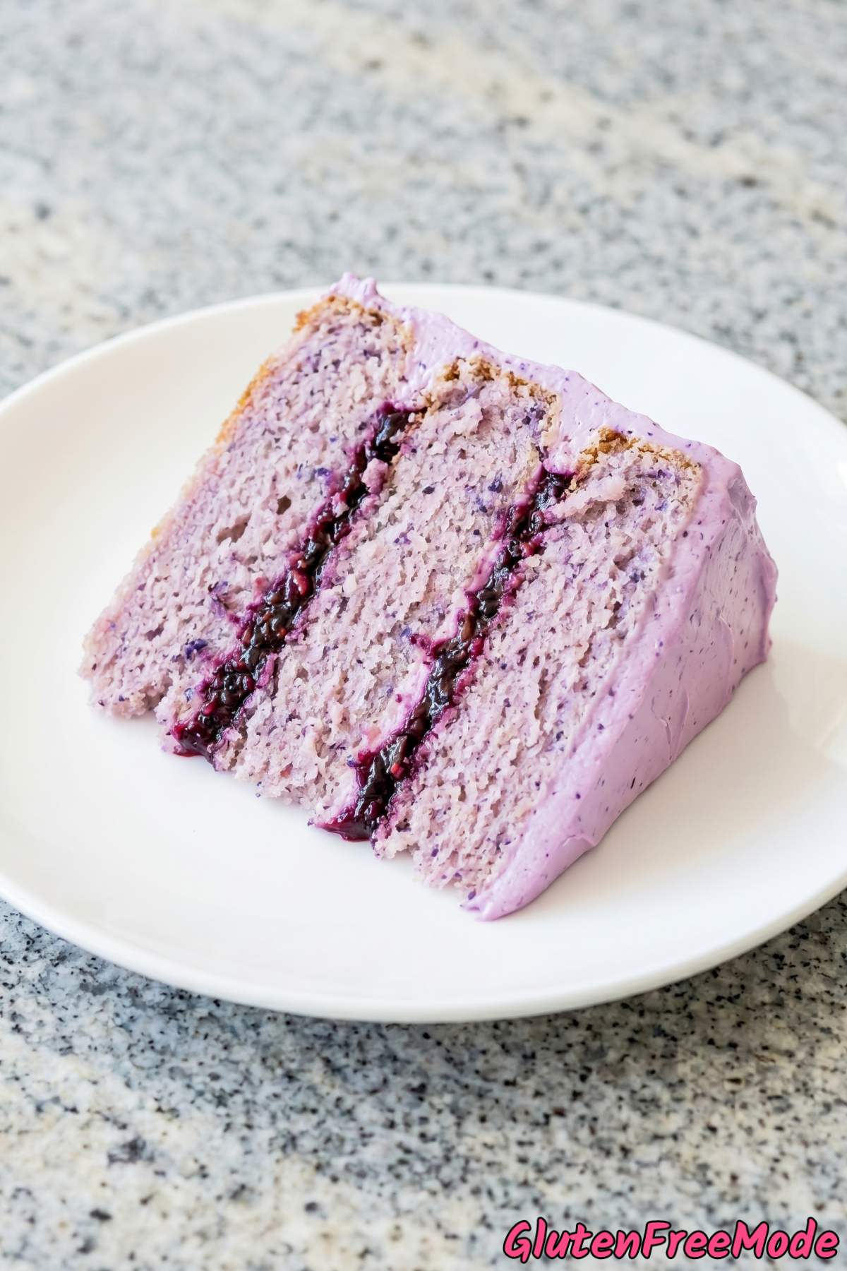 Elegant blackberry lavender layer cake slice