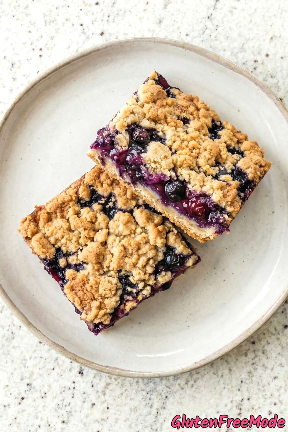 Stacked gluten free blueberry crumble bars