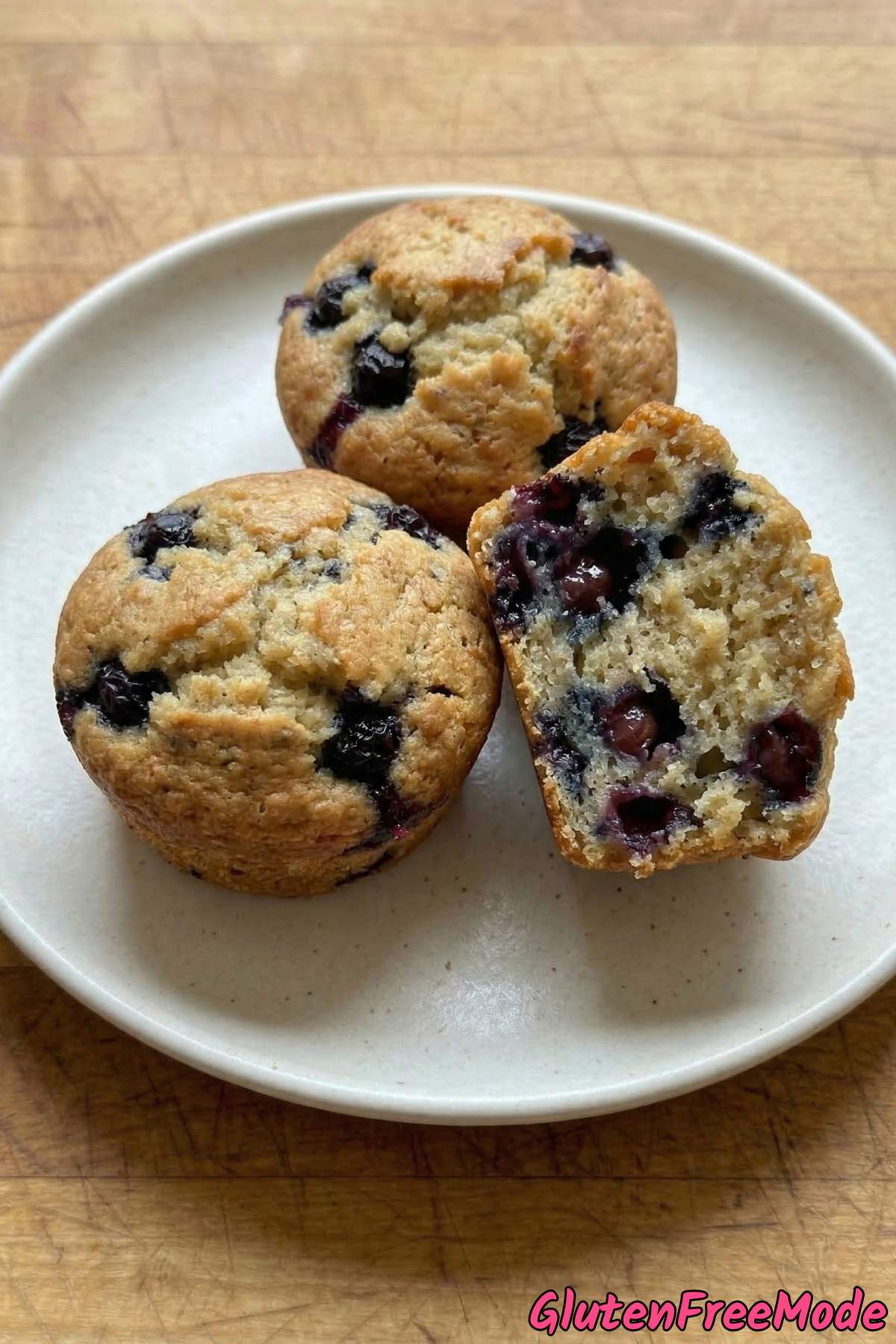 Moist gluten free blueberry muffins with berries