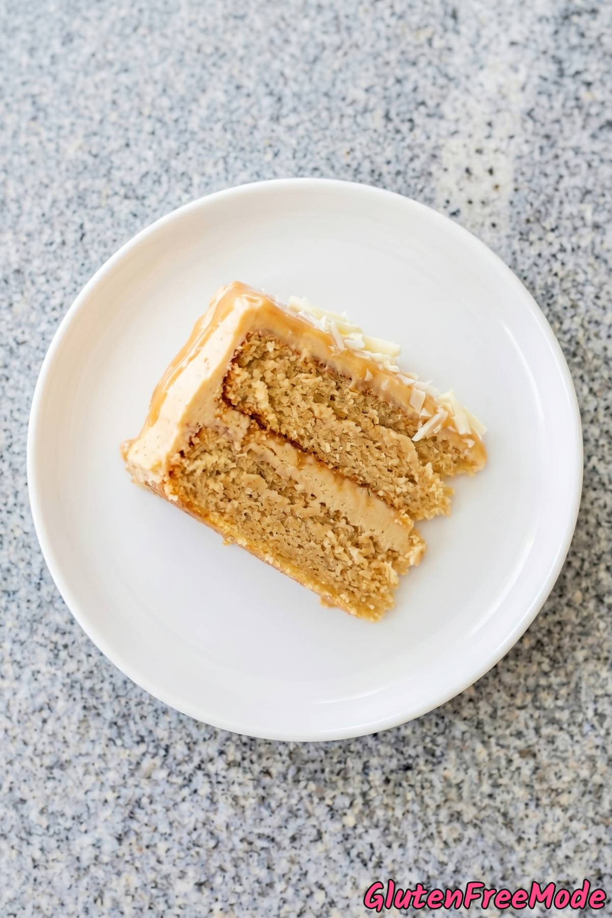 Rich caramelized white chocolate layer cake slice