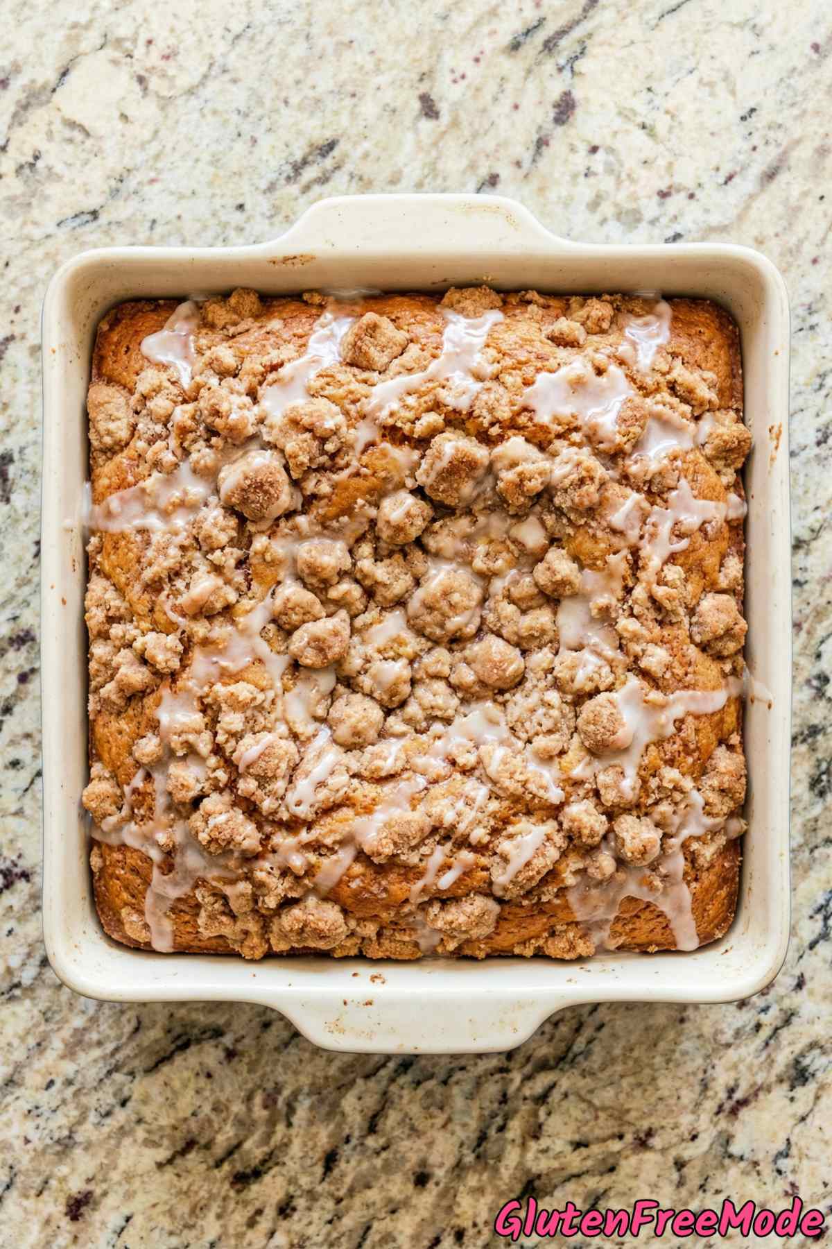 Warm gluten free cinnamon crumb cake piece
