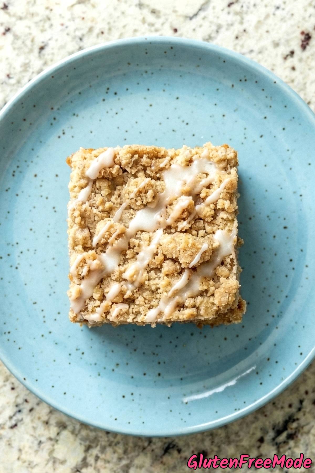 Rich gluten free classic coffee cake on plate