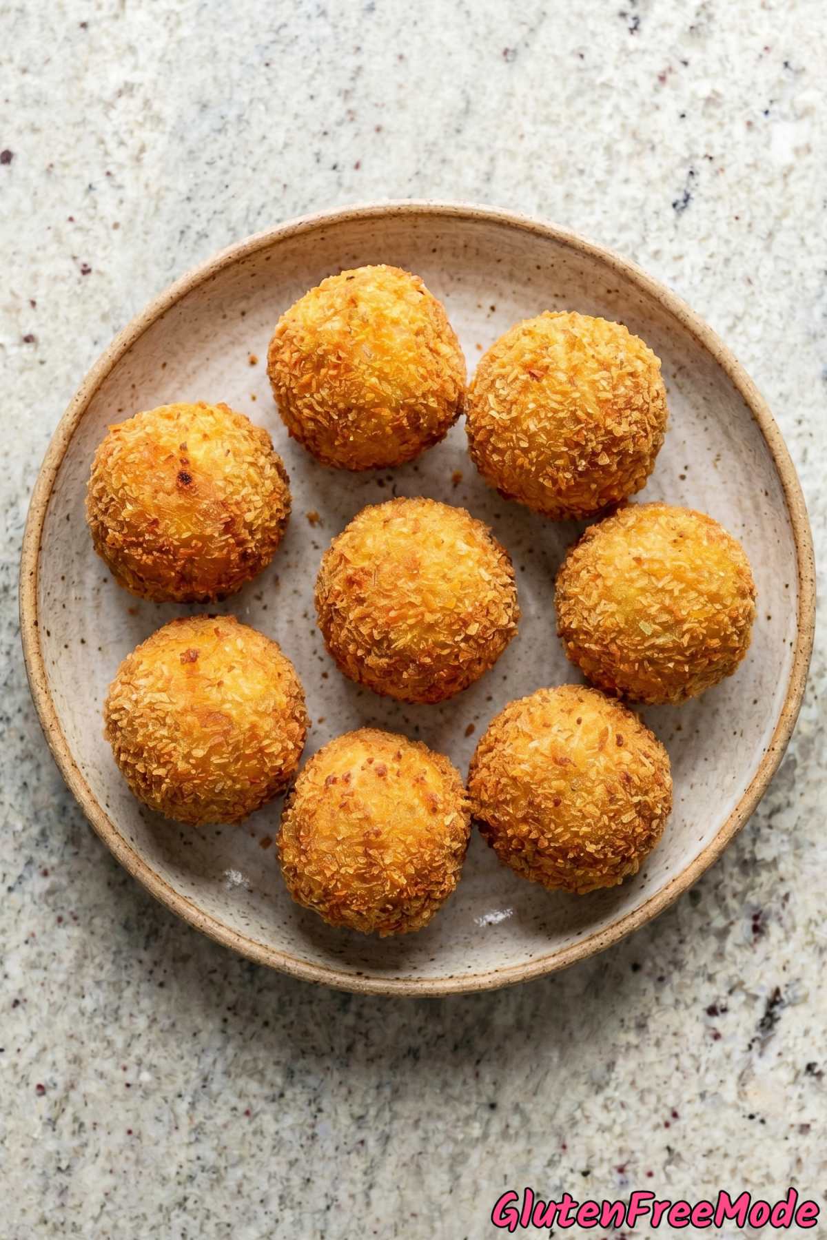 Homemade gluten free crispy cheesy arancini