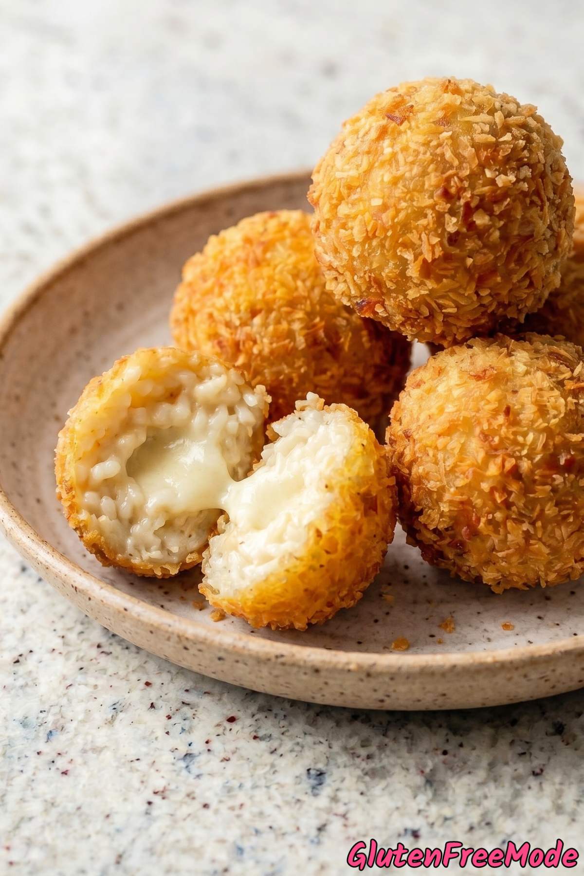 Crunchy gluten free cheesy arancini close-up