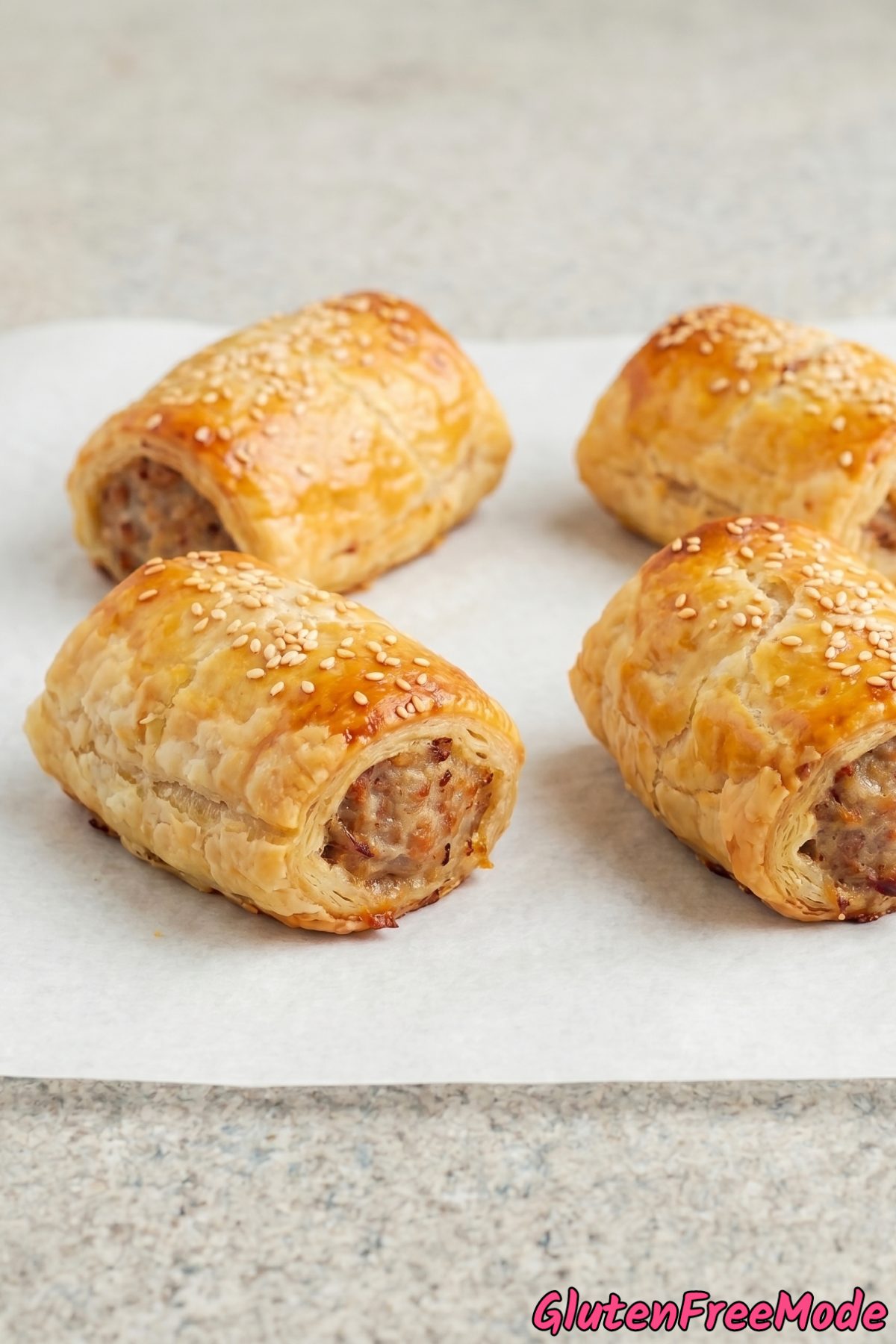 Gluten free crispy sausage rolls on a plate