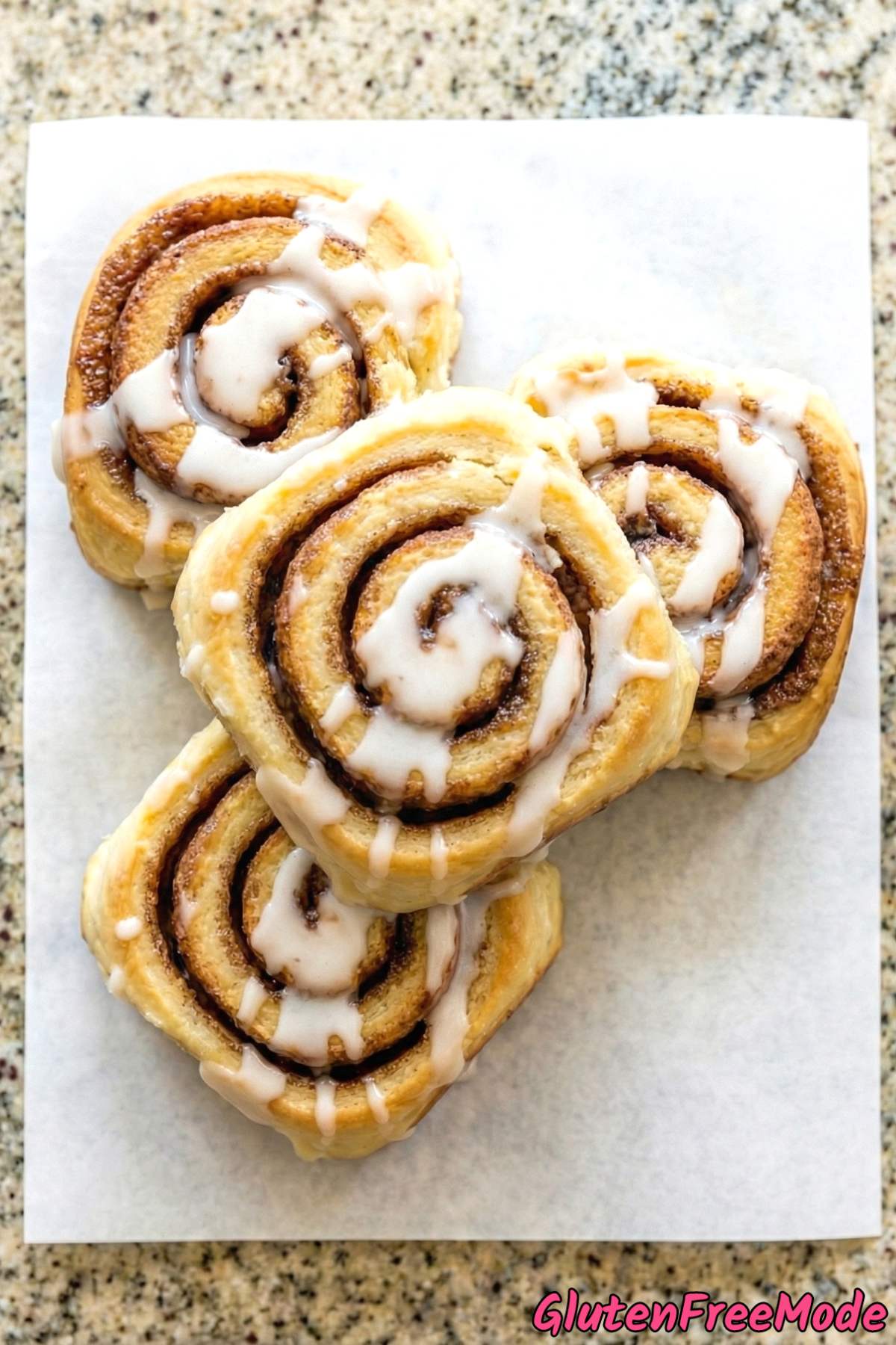 Decadent gluten free fluffy cinnamon rolls frosted