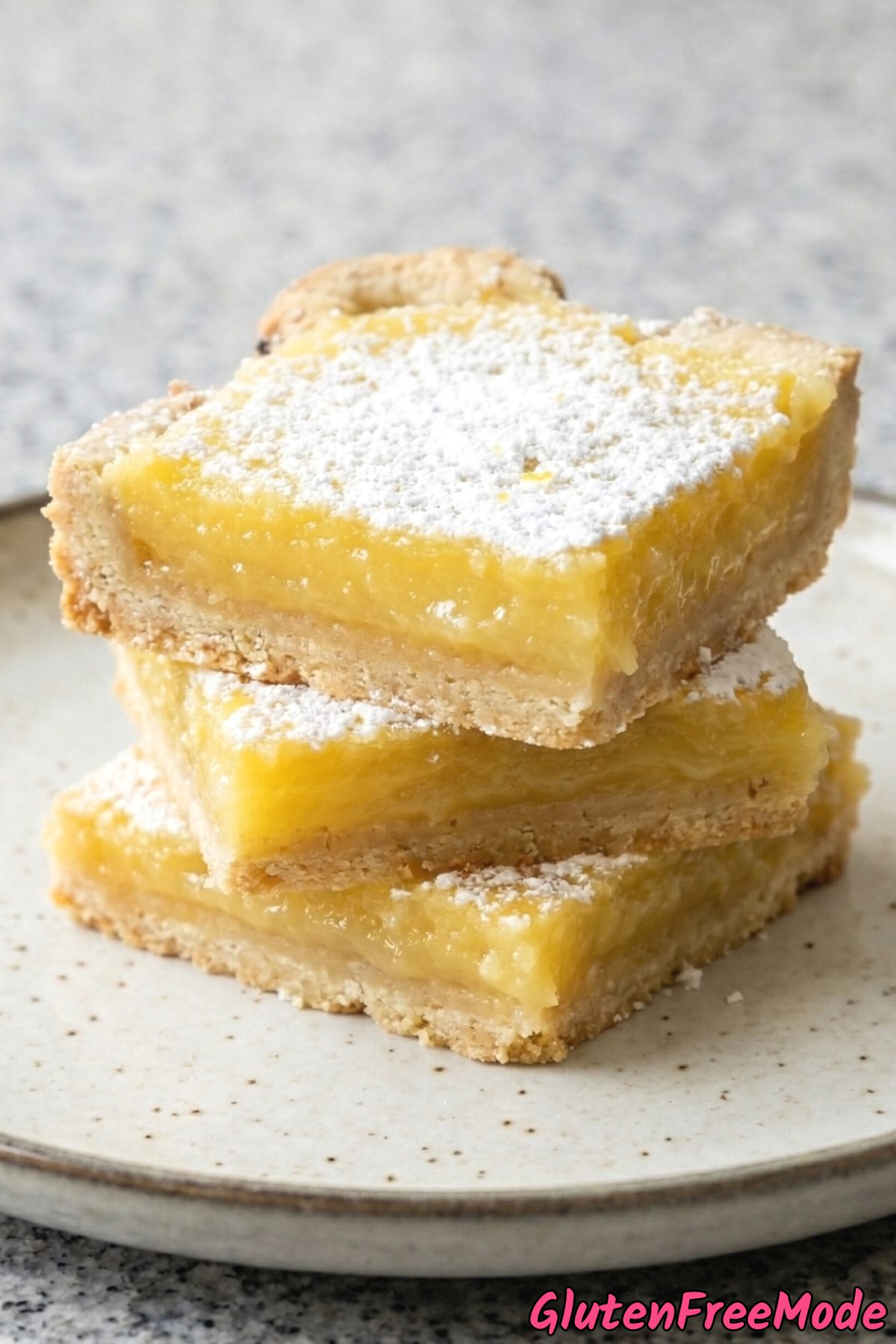 Fresh gluten free gooey lemon bars sliced