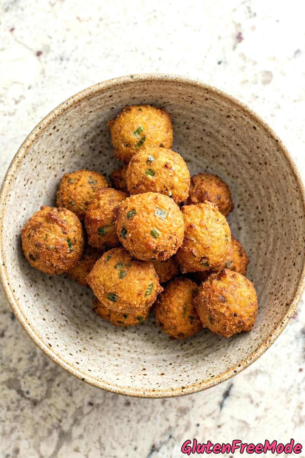 Fluffy gluten free hush puppies stacked high