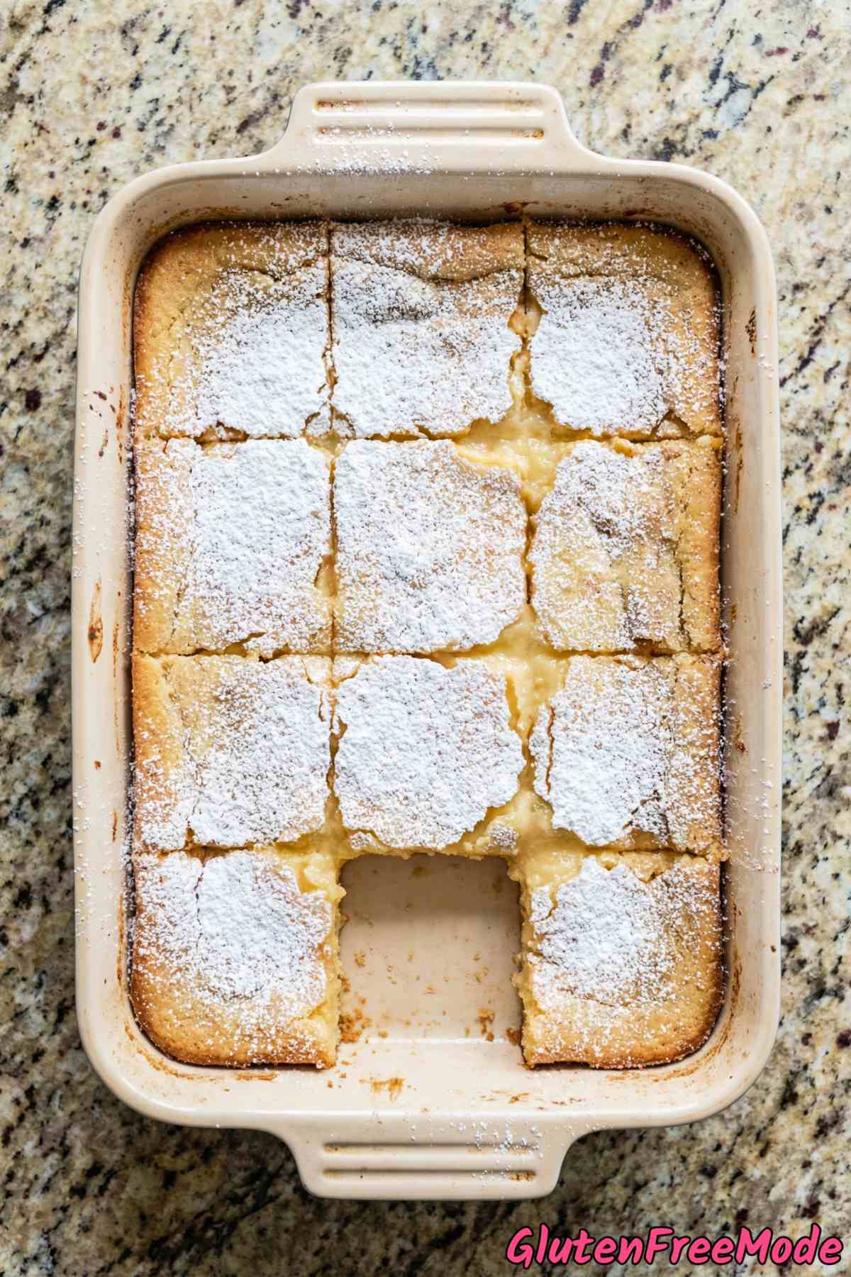 Warm gluten free ooey gooey butter cake piece