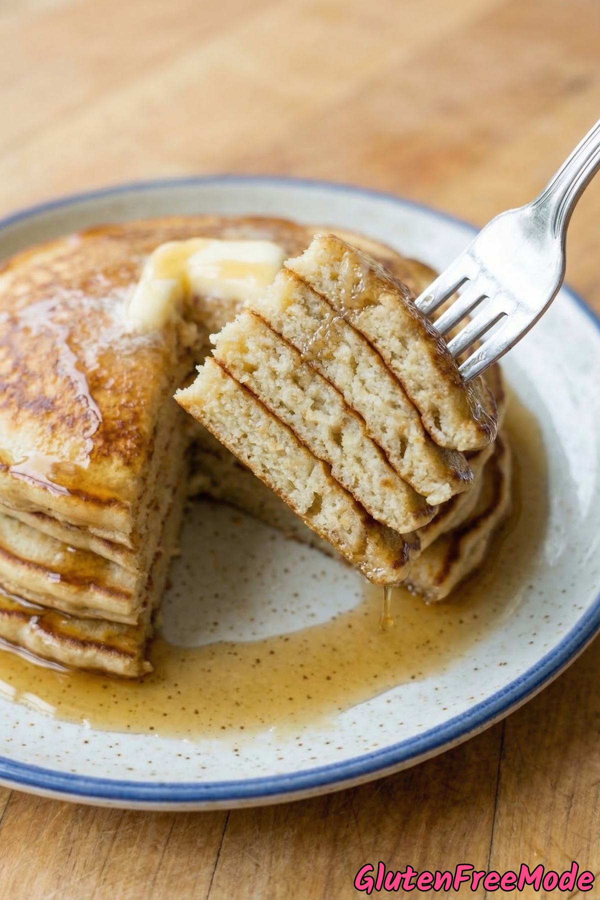 Golden gluten free pancakes stacked high