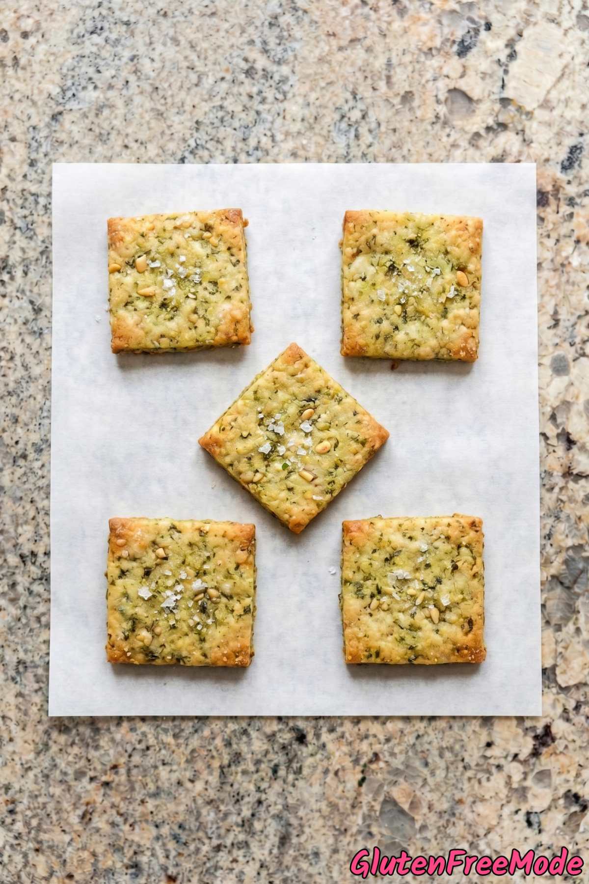 crunchy gluten free pesto crackers with parmesan