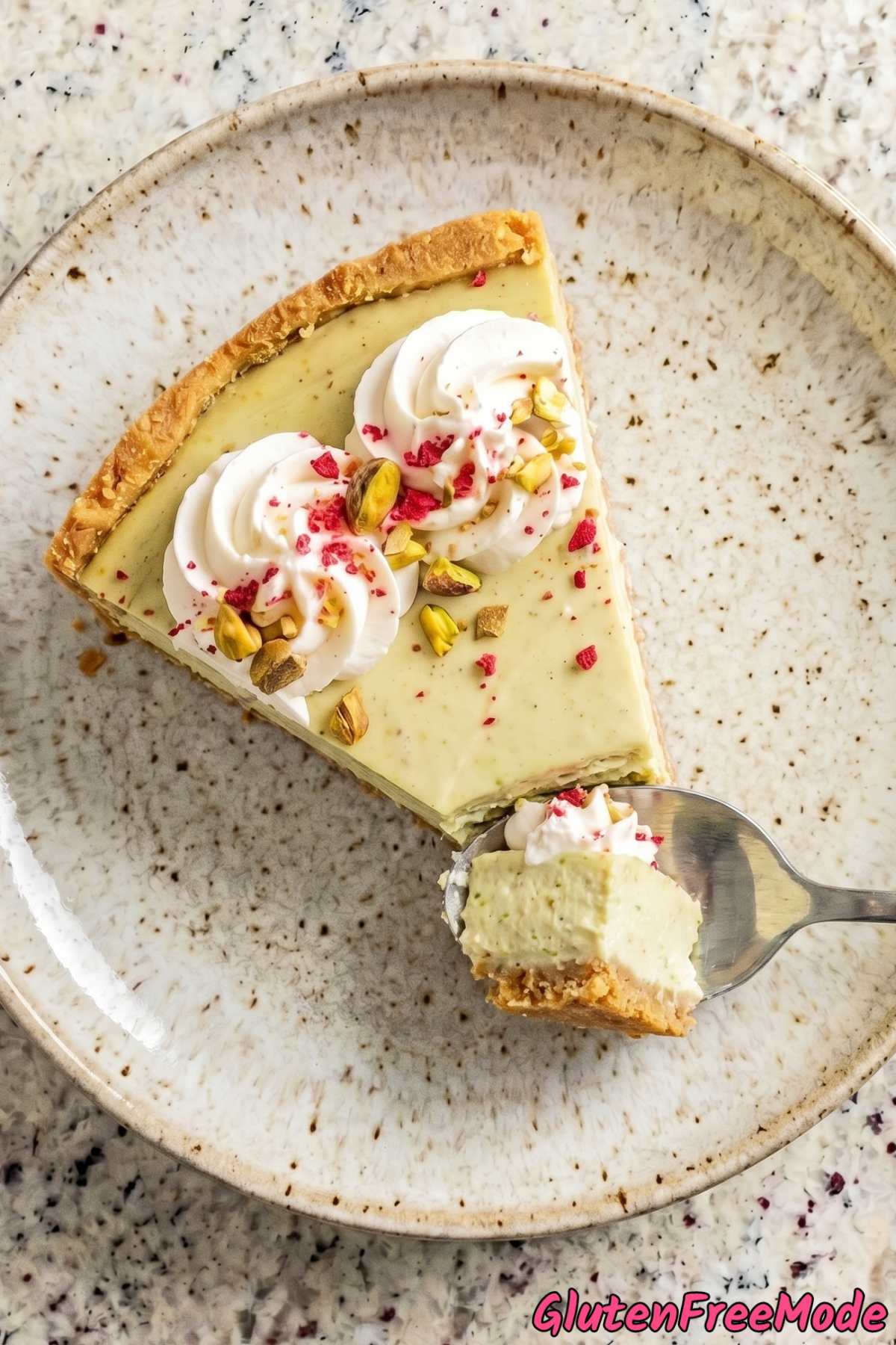 Rich gluten free pistachio cheesecake slice