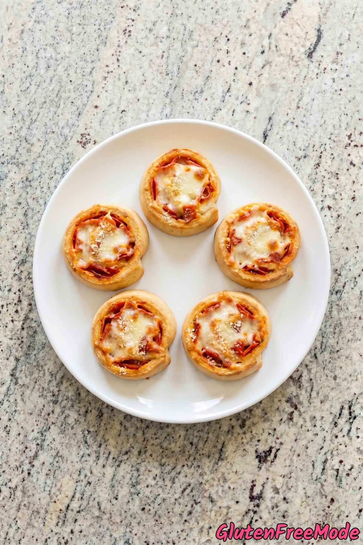 Delicious gluten free pizza rolls on a tray