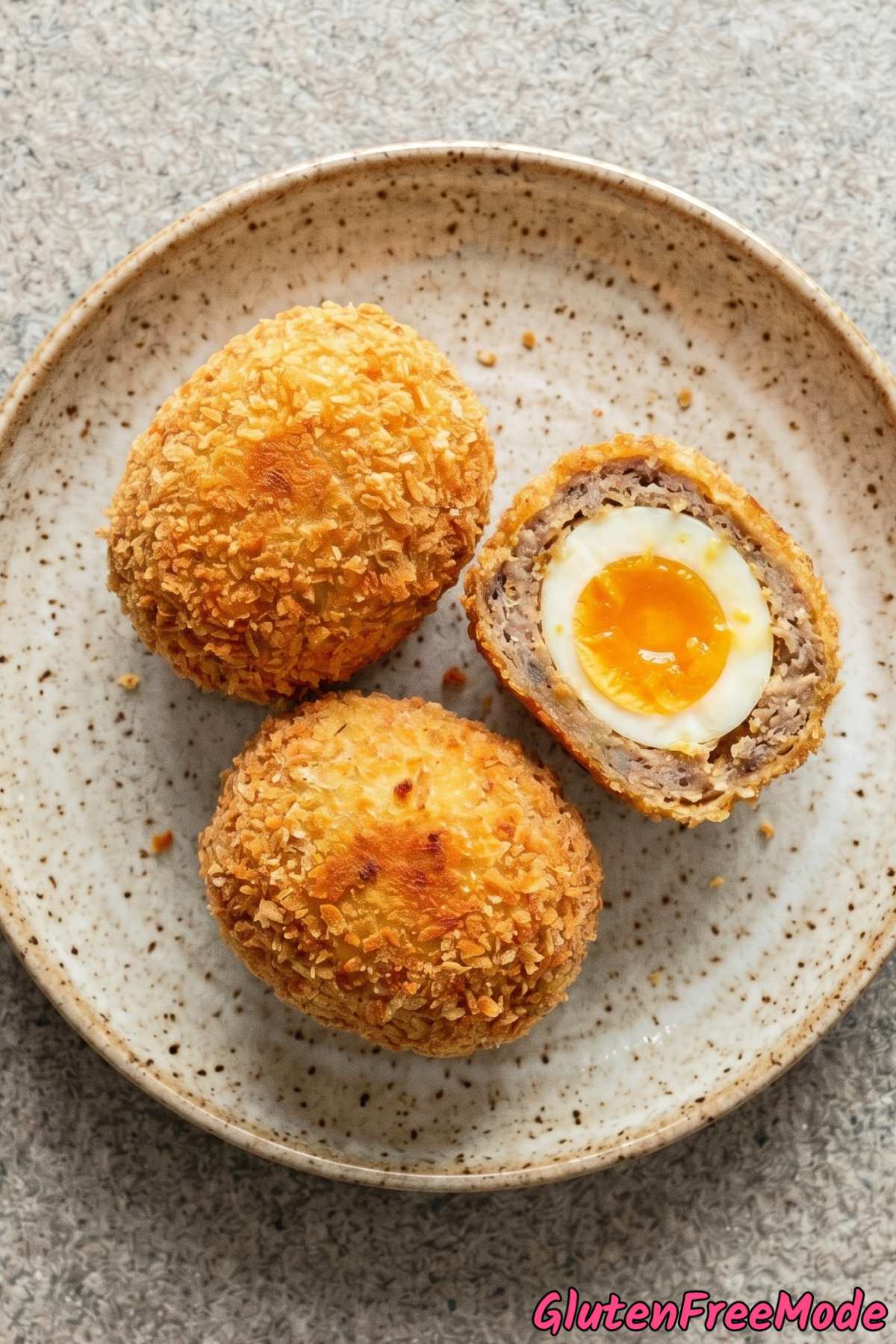 Juicy gluten free scotch eggs cut in half