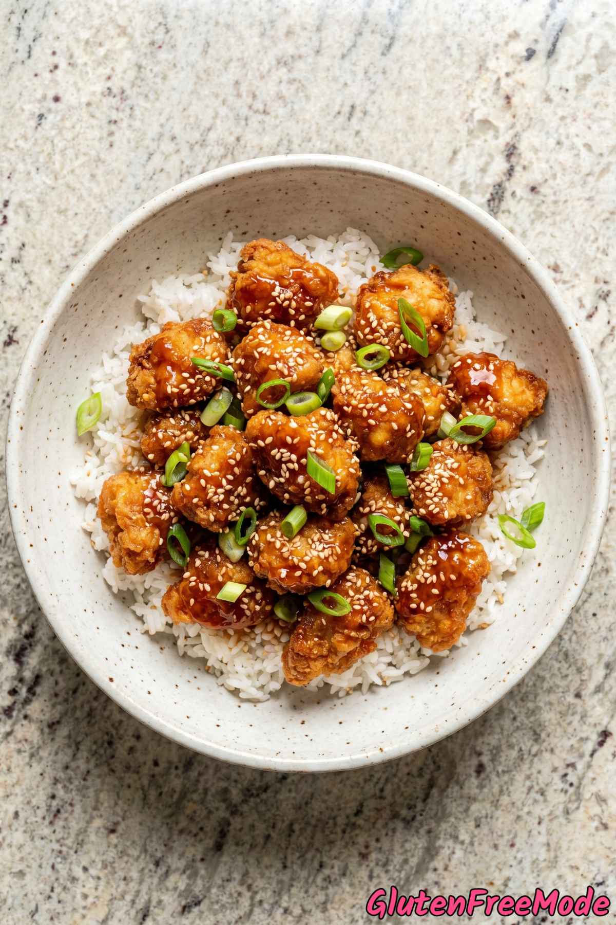 Sticky gluten free sesame chicken closeup