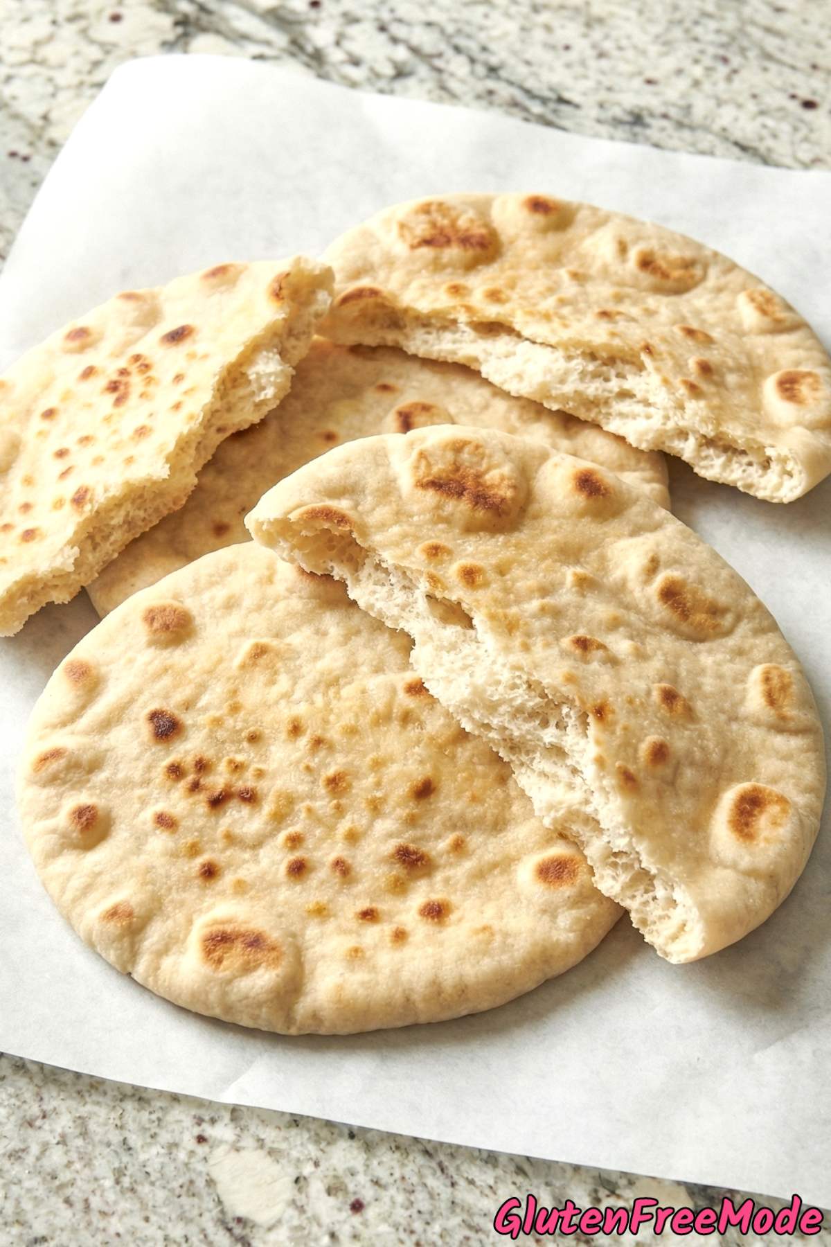 Comforting gluten free soft pita bread torn open