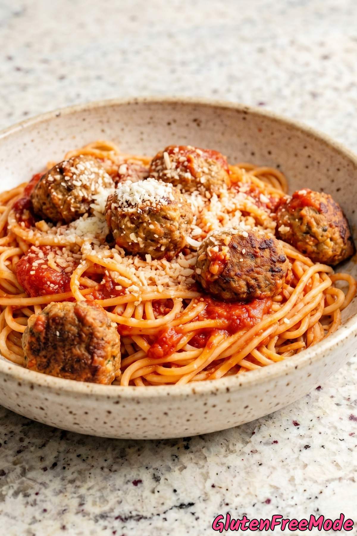 Rich gluten free spaghetti & meatballs plate