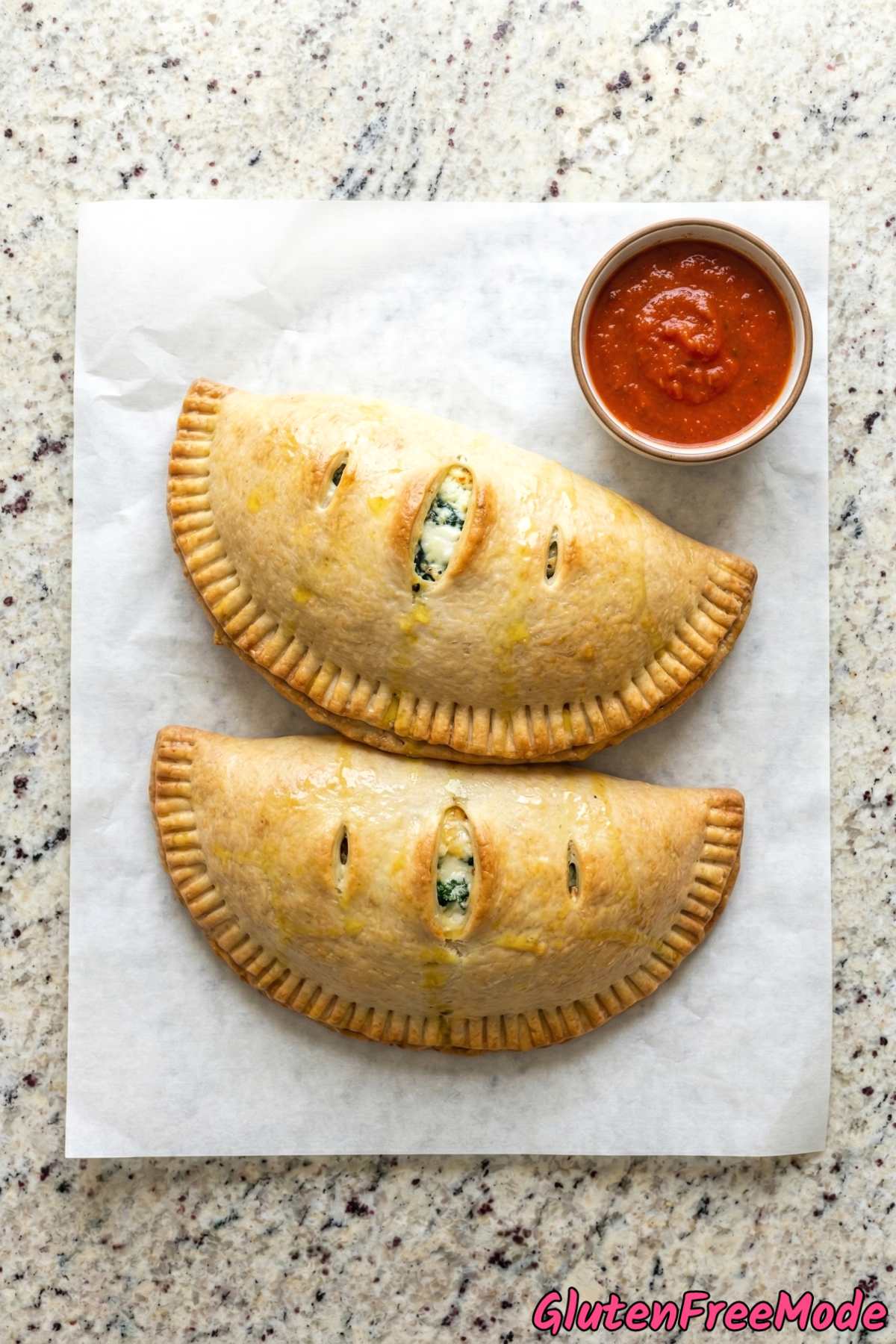 Warm gluten free spinach and cheese calzones