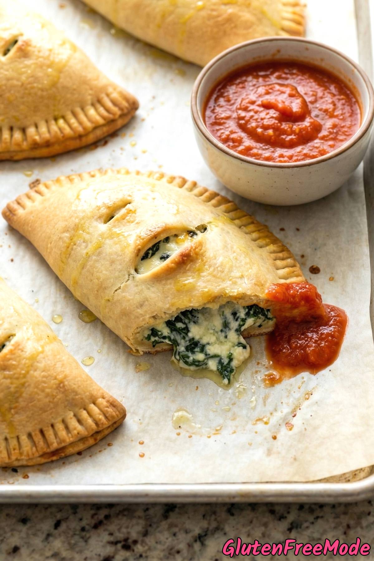 Crispy gluten free spinach & cheese calzones