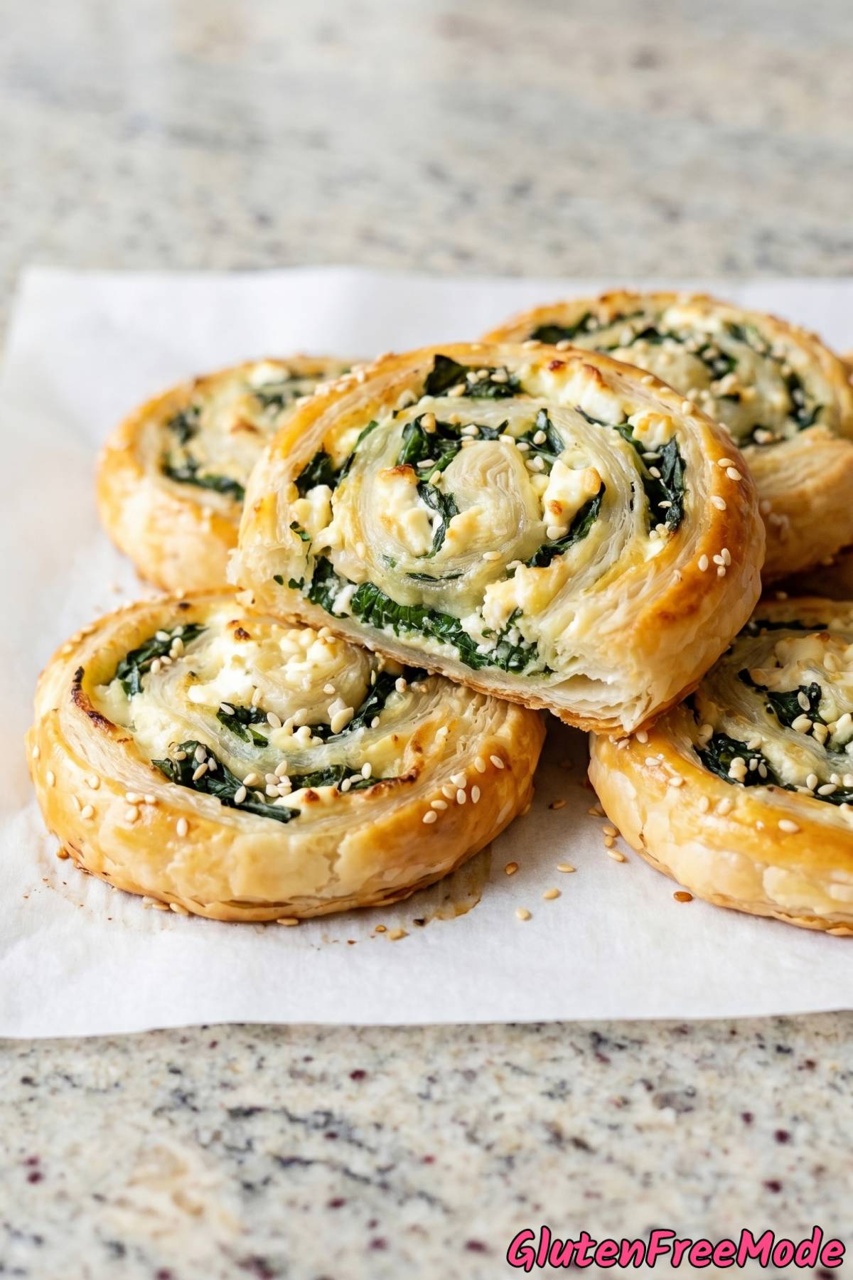 Golden gluten free spinach & feta pinwheels