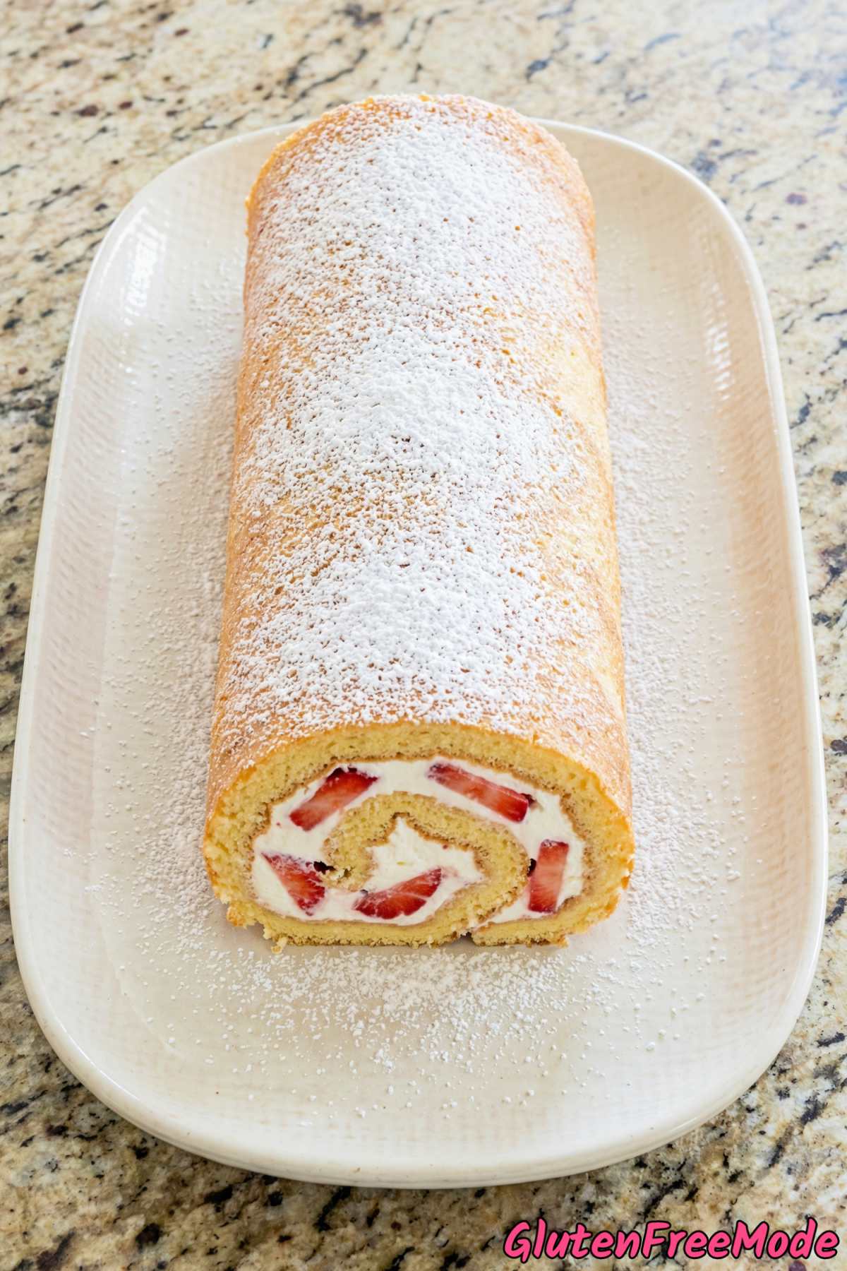 Decadent gluten free strawberry cream cake roll