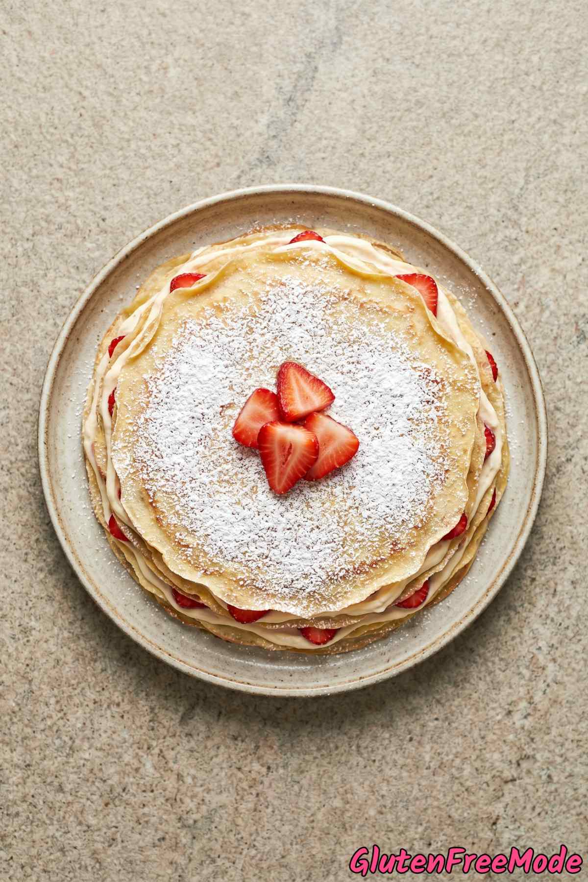 Elegant gluten free strawberry mille crepe cake