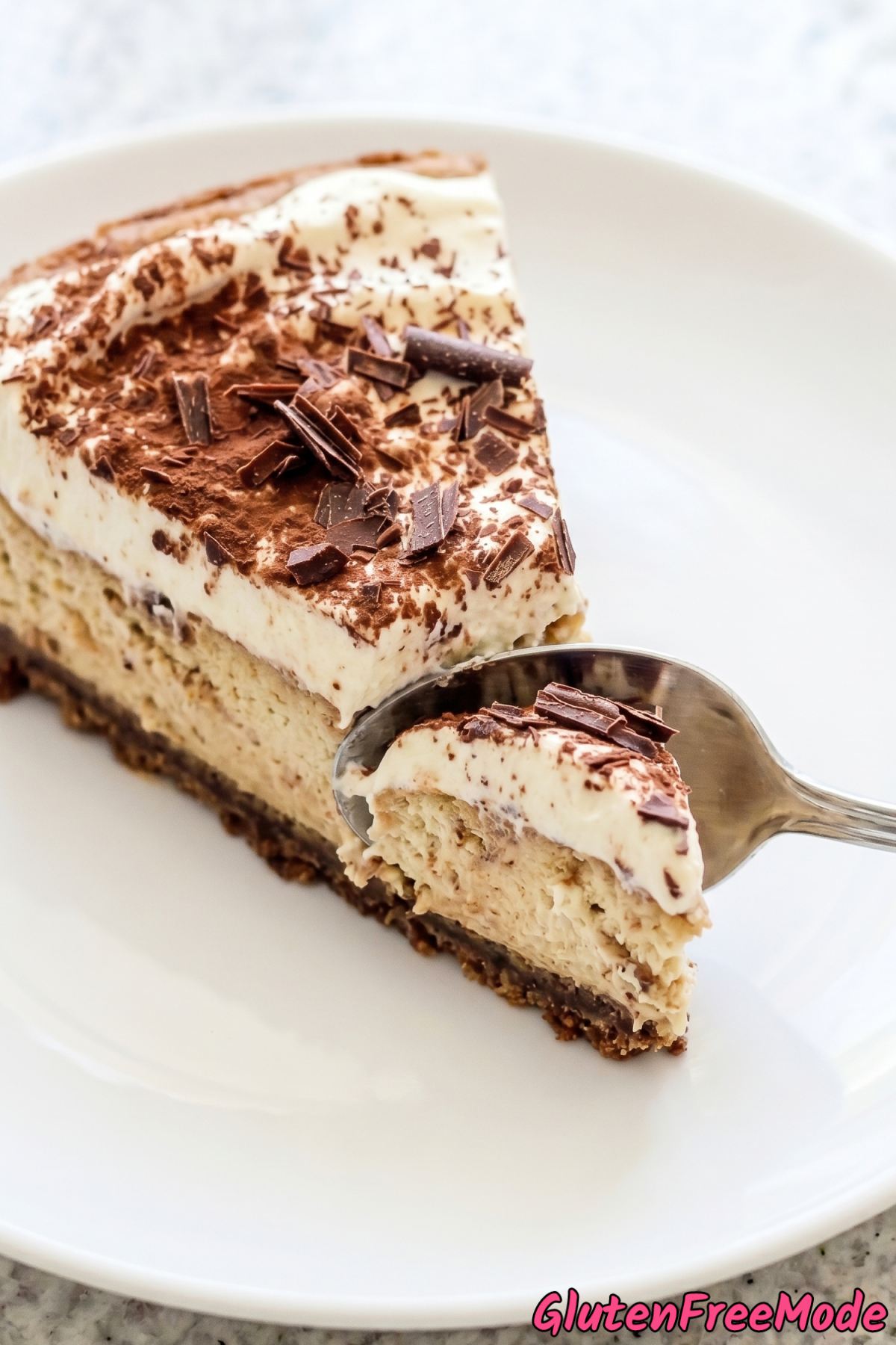Creamy gluten free tiramisu cheesecake slice