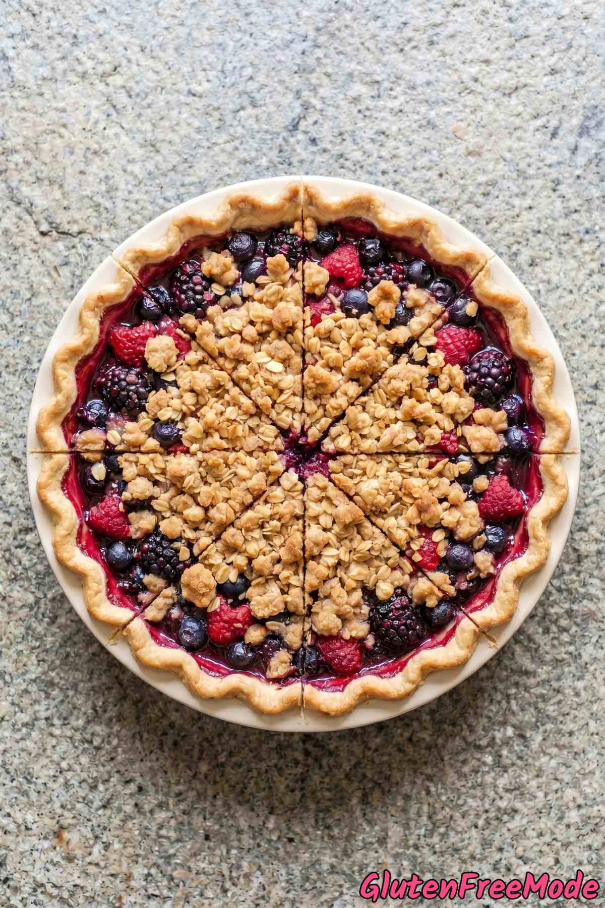 Warm gluten free triple berry crumble pie